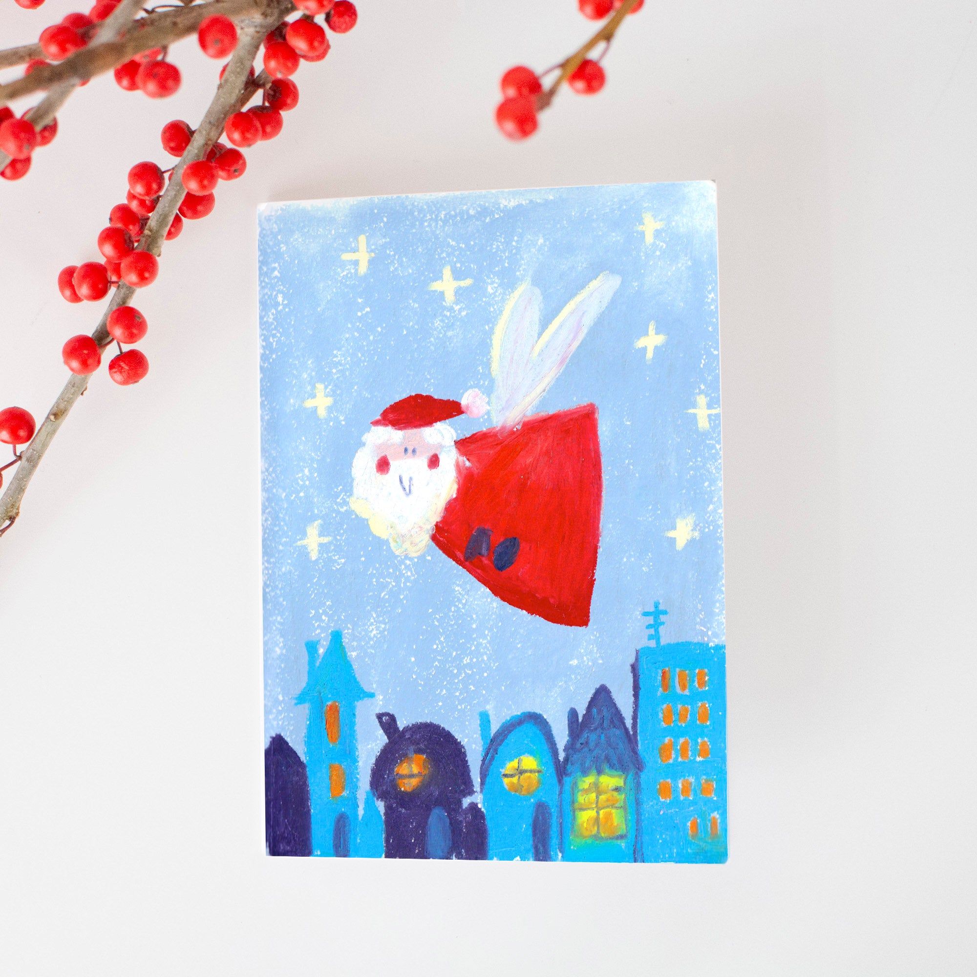 Weihnachtskarte "Weihnachtsmann über der Stadt"